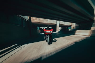 2025_cvo-road-glide-st_my25-fltrxstse-riding-0723-abjc